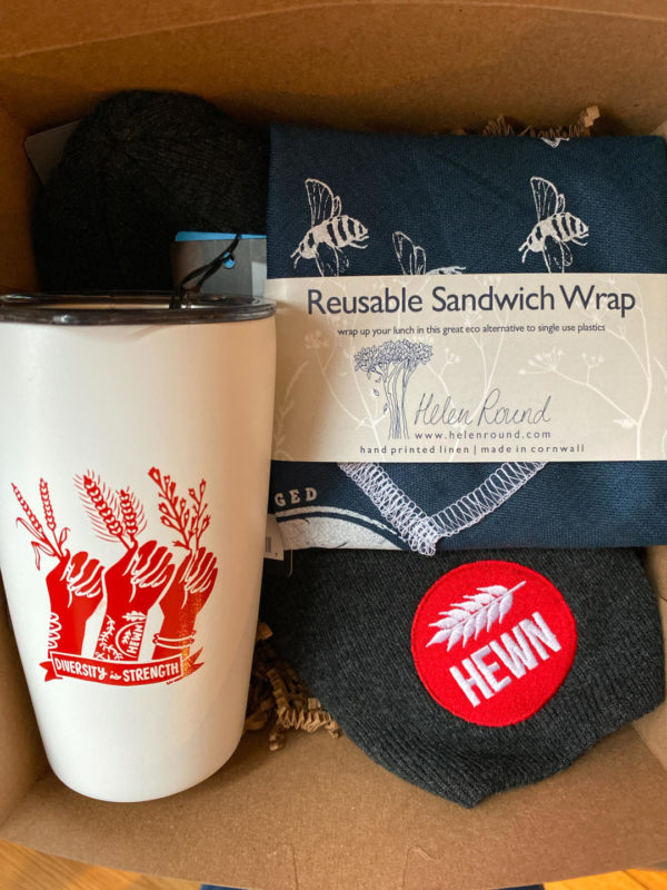 gift box with reusable sandwich wrap, hewn beanie and a portable mug